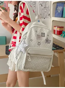Mochila blanca transparente con lunares y estrellas, detalle bonito para estudiantes.