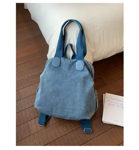 Sac à dos et cabas en jean rétro lavé pour femme, grand format idéal pour le quotidien.