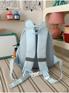 Detailed view of cute light blue kids backpack with bear ears, reflective strips and chest buckle.