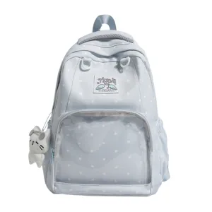 Dettagli zaino ita a pois azzurro, design con tasca frontale trasparente, simpatico ciondolo gatto.