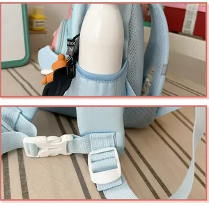 Blue kids backpack detail shot showing side pocket water bottle holder and sturdy buckle.