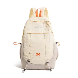 Detail view of the stylish casual backpack featuring contrast color and front bungee cord.