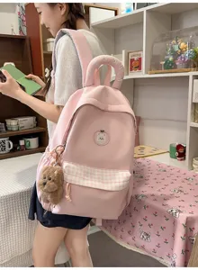 Rosa süßer Studentenrucksack mit Karomustertasche, flauschigem Welpenanhänger und Bärchen.