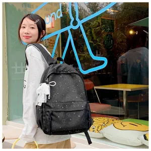 Sac à dos d'écolière grand capacité motif cœur mignon style INS japonais pour filles usage quotidien.