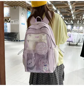 Sac à dos étudiant colorblock mignon avec grande capacité et poche en filet transparente.
