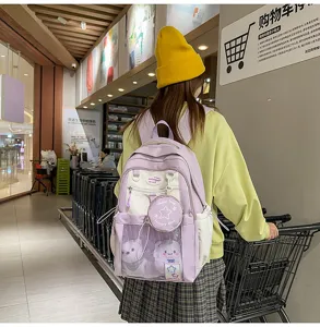 Joli sac à dos scolaire de grande capacité avec multi-poches en couleur violet clair.