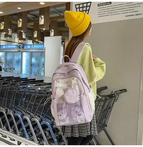 Joli sac à dos scolaire d'étudiant bicolore de grande capacité avec poche transparente.