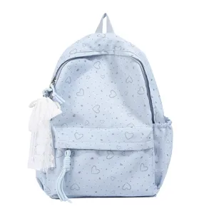 Joli sac à dos bleu clair imprimé de cœurs avec pendentif en dentelle pour étudiants.