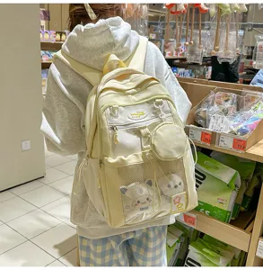 Joli sac à dos étudiant grand léger color-block avec poche filet avant pour femme.