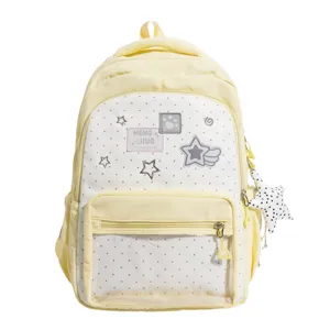 Japanischer süßer Polka-Dot-Schulrucksack für Oberschüler in Gelb und Weiß mit Sternanhänger.