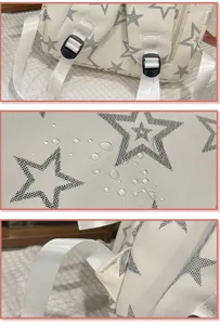 Detailed view of the cute star print backpack showing waterproof fabric, sturdy straps and buckles.