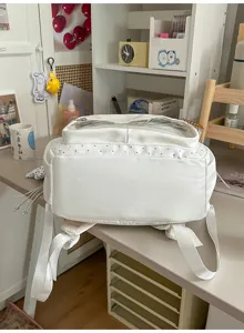Mochila blanca con ventana transparente y lunares lindos para estudiantes y uso diario escolar.