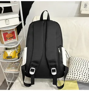 Sac à dos étudiant color block décontracté avec grande capacité et design léger pour l'école.