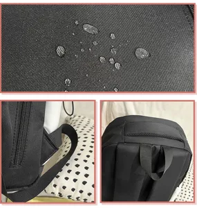 Vue détaillée du sac à dos noir pour étudiant montrant le tissu imperméable et fermeture.
