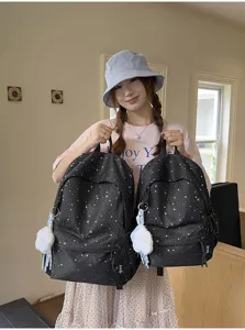 Niedlicher Rucksack mit Sternenmuster für Schüler, große Kapazität, leicht, mit Plüschanhänger.
