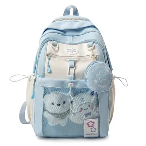 Sac à dos d'étudiant mignon de couleur contrastée avec poche en maille et jolie peluche.