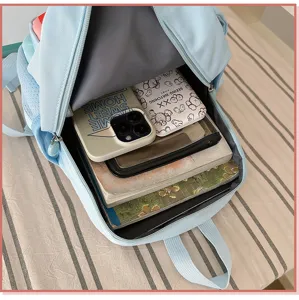 Detailed view of the kids schoolbag interior showing spacious capacity, cute school backpack.