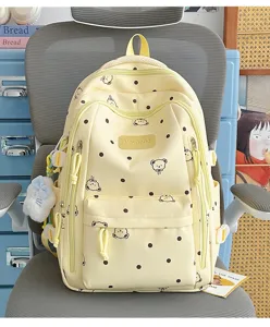 Mochila escolar de gran capacidad para estudiantes con estampado de oso y lunares amarillo