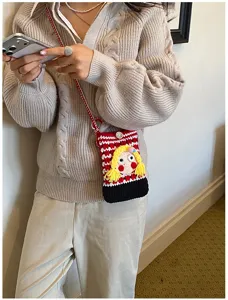 Geklauftes Handytasche mit süßem Cartoon-Mädchen, rot-weißes kariertes Umhängetaschendesign.