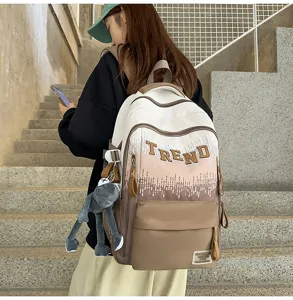 Stylish gradient school backpack for teen girls, large capacity casual everyday bookbag.