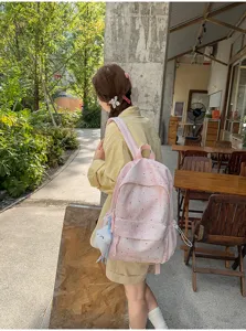 Süßer Rucksack mit Sternenmuster für Schüler, große Kapazität für Pendler und Schule.