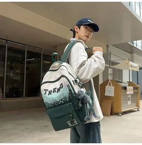 Stylish gradient canvas backpack for students, large capacity school bag with trendy letters.