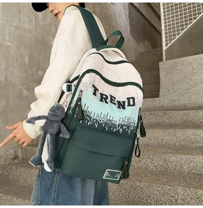 Detail view of the stylish gradient letter school backpack, large capacity for students.