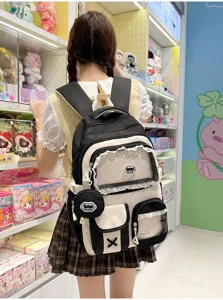 Zaino da studente nero e bianco grande capacità borsa scolastica con tasca trasparente.