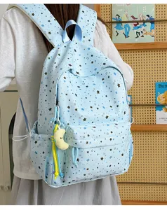 Cute Japanese star print student backpack with large capacity and light blue design.