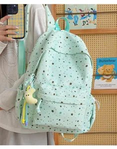 Cute Japanese style star print student backpack detail shot, lightweight large capacity bag.