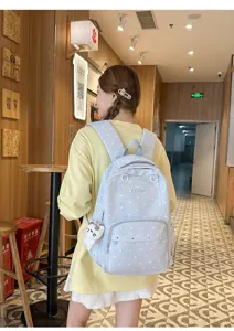 Sac à dos style collège à pois mignons pour l'école le voyage et le quotidien grande capacité.