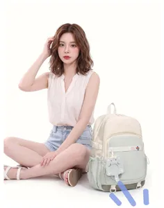 Sac à dos d'étudiant mignon de grande capacité avec pendentif chat pour l'école.