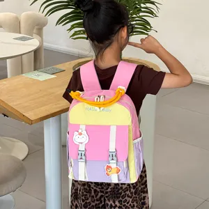 Cute color block kids backpack detail shot, stylish kindergarten school bag for children daily use.