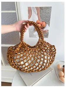 Sac cabas en perles de bois fait main pour femmes, élégant sac de plage ajouré avec pochette.