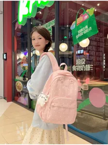 Joli sac à dos rose à pois pour femme élégant cartable étudiant voyage avec pendentif chat.