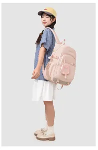 Sac à dos d'étudiant rose avec pendentif chat, grand cartable décontracté pour un usage quotidien.