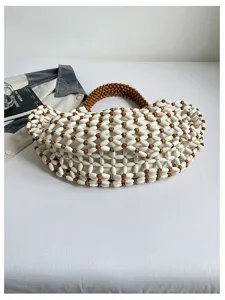 Sac a main cabas d'epaule ajoure en perles de bois tisse pour plage et femmes elegantes