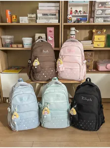 Large capacity multi-compartment student school backpack featuring cute star print.