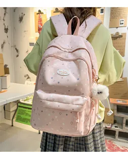 Joli sac à dos scolaire rose motif étoiles préppy multi-compartiments grande capacité.