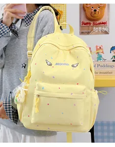 Niedlicher japanischer Punktmuster-Canvas-Schulrucksack in Pastellfarben für den Alltag.