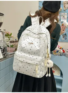 Joli sac à dos style collège avec motif étoiles pour étudiants et usage quotidien.