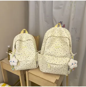 Süßer Blumen Schulrucksack für Mädchen, großer lässiger Tagesrucksack mit Sternanhänger.
