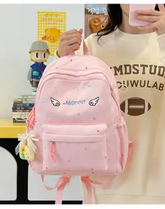 Süßer rosa Pünktchen Schulrucksack für Mädchen mit süßer Engelsflügel-Bestickung.