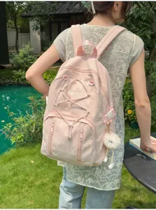 Japanese style minimalist pink drawstring student backpack with large capacity for school teens.