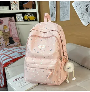 Cartable rose mignon imprimé étoiles pour filles, grand sac à dos scolaire multi-compartiments.