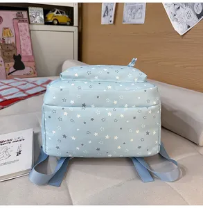 Sac à dos scolaire mignon avec motif d'étoiles pour filles, grande capacité et multiples poches.