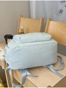 Japanese style simple large capacity student backpack, casual light blue school bag.