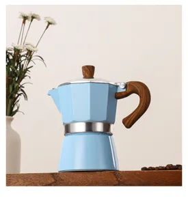 Italian aluminum Moka pot detail shot, classic octagonal coffee maker with wood grain handle.