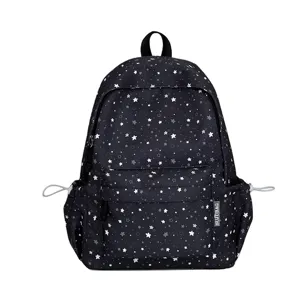 Detail view showing the star print detail, front pocket, and side storage of the backpack.