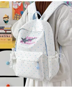 Japanese cute polka dot canvas school backpack for students, large capacity casual book bag.